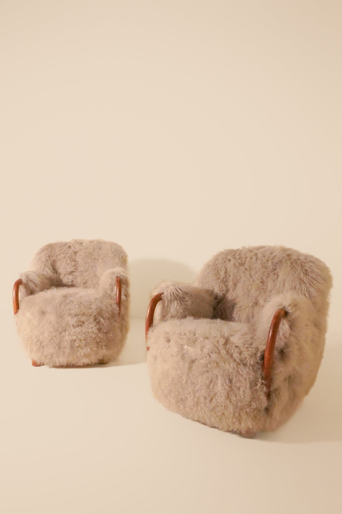 Attributed to Viggo Boesen, Pair of Lounge Chairs, Denmark, 1940s — Wood and Shearling