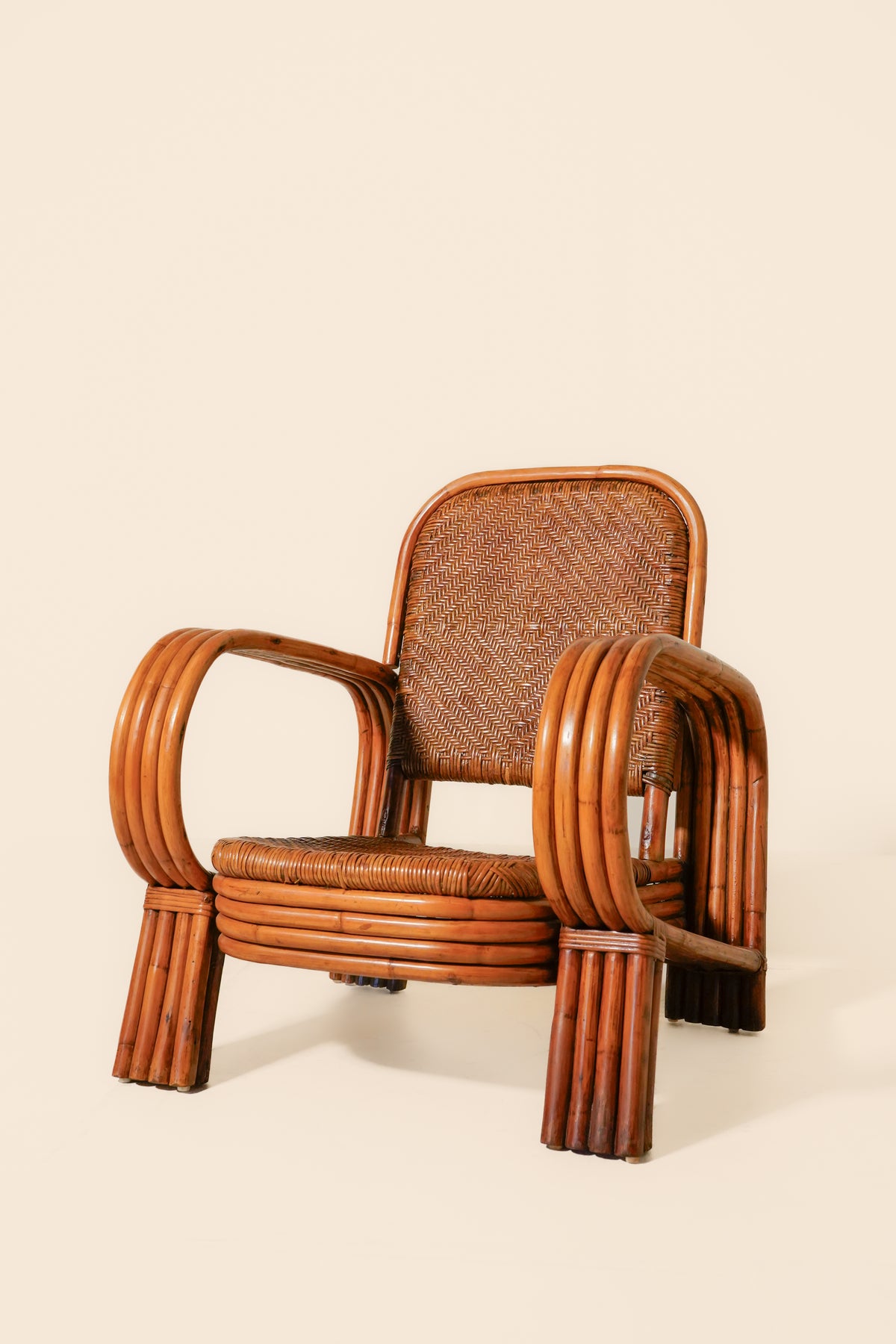Pair of Bent Rattan Lounge Chairs — Mid-20th Century