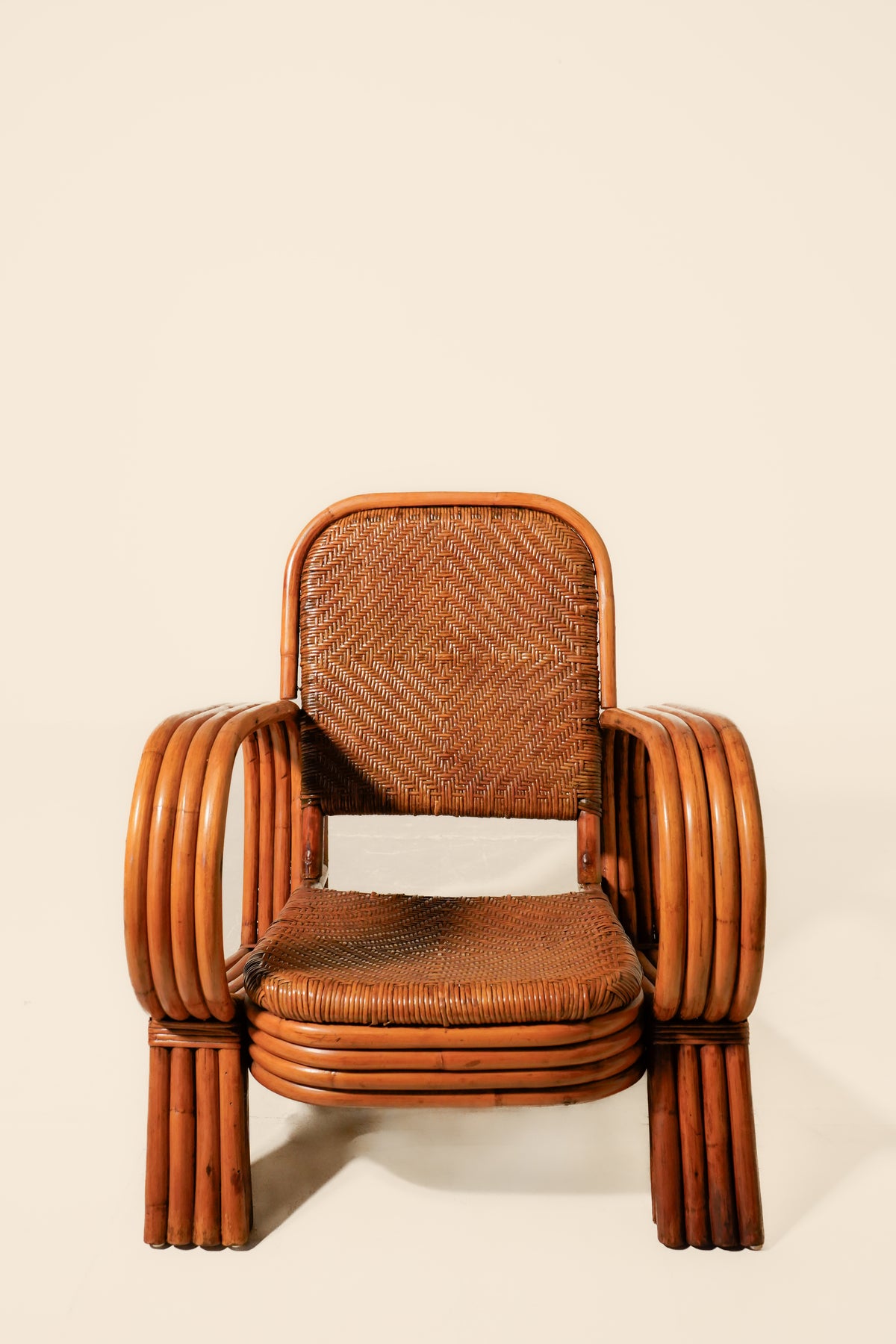Pair of Bent Rattan Lounge Chairs — Mid-20th Century